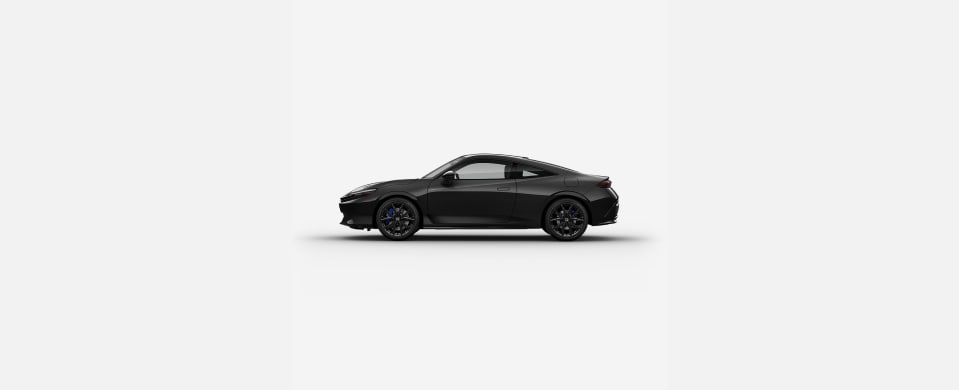 2027 Honda Prelude Hybrid in Crystal Black Pearl profile parked in a clean white studio setting (Exhilarating Hybrid Coupe).