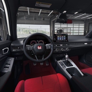 Interior view of a 2026 Honda Civic Type R parked in a garage