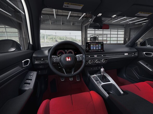 Interior view of a 2026 Honda Civic Type R parked in a garage